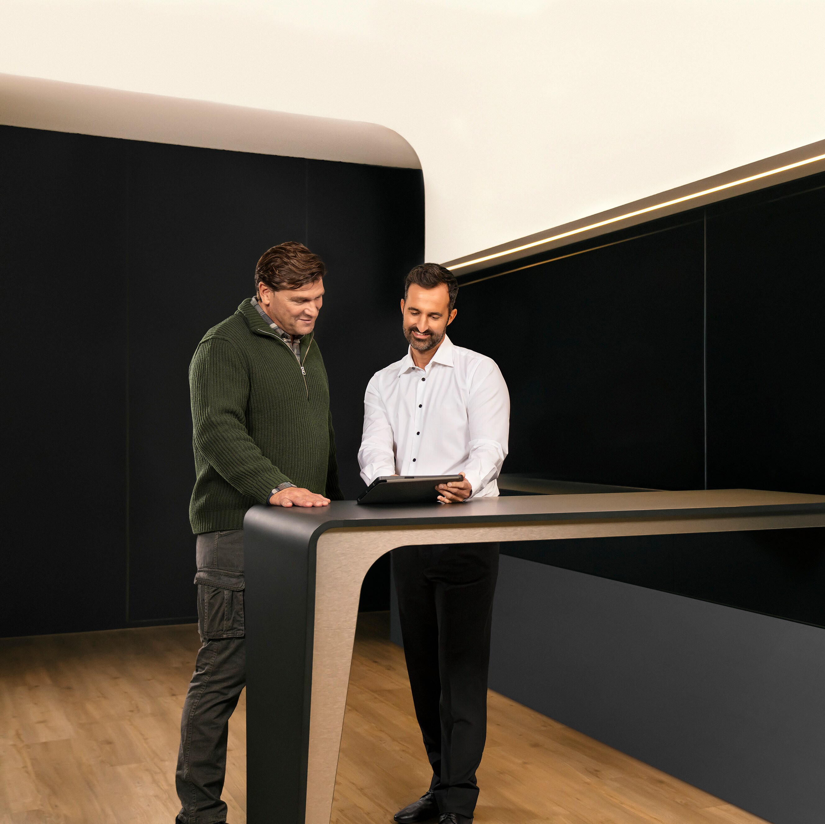 Mercedes-Benz representative speaking to a customer